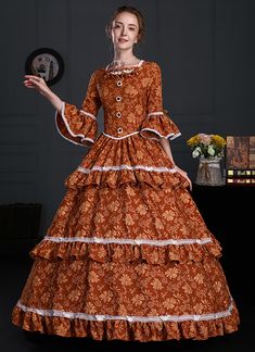 Buy high quality 2022 Historical Lady Colonial Victorian Prairie Dress Orange Floral Cotton Faire Princess Gown Theater Clothing at low price.Shop for Vintage Authentic Victorian Dresses,Ballgowns,Special Occasion Dresses,Masquerade Party Dresses online. Masquerade Party Dresses, Bustle Dresses, Gothic Victorian Dresses, Pioneer Dress, Cotton Gowns, Bustle Dress, Party Dresses Online, Princess Gown, Historical Period