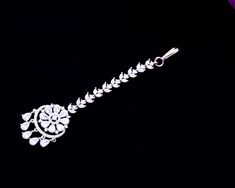 This is a beautiful Mangtikka, made with American Diamond. This work well with all types of clothing, whether it be formal attire or a casual party. Eye-catching and unique jewellery that will set you apart. Gift this piece to a loved one, and see their face light up with joy. Best for gifting or for personal use, wear it to any occasion and be in the spotlight. Diamond Maang Tikka, Types Of Clothing, Kids Handicraft, Saree Petticoat, Saree Jewellery, Silver Pooja Items, Glass Bangles, Maang Tikka, Silver Toe Rings