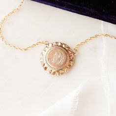 This one-of-a-kind necklace is composed of: Victorian medallion from the late 1800s with the initials "GLB" hand-engraved in the center. This necklace measures a standard 18” on a modern 14k gold filled chain, with the pendant measuring 0.875" in height. Victorian Style Medallion Coin Pendant Jewelry, Luxury Yellow Gold Necklace With Vintage Charm, Victorian Jewelry With Engraving Option For Gifts, Classic Adjustable Engraved Necklaces, Elegant Commemoration Coin Pendant Jewelry, Adjustable Yellow Gold Necklaces With Initials, Adjustable Yellow Gold Initials Necklace, Classic Adjustable Engraved Necklace, Classic Engraved Adjustable Necklace