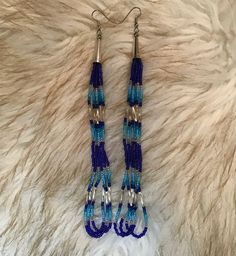 "Authentic Beautiful Native American Indian Jewelry Navajo Hand Beaded Long Dangle Earrings. Great for a gift❤️ Handcrafted by Navajo Artist R. Sellers These beautiful earrings are 6.75 in length and 1\" in width." Southwestern Style Blue Earrings For Festivals, Southwestern Style Blue Festival Earrings, Silver Southwestern Beaded Earrings With Ear Wire, Southwestern Silver Beaded Earrings With Ear Wire, Southwestern Dangle Beaded Earrings, Southwestern Blue Beaded Earrings With Round Beads, Blue Hand-strung Dangle Beaded Earrings, Southwestern Adjustable Dangling Bead Earrings, Handmade Southwestern Blue Beaded Earrings