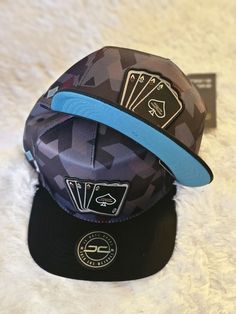 Add a pop of color to your casual outfits with this 100% original JC HATS snapback. Crafted from soft cotton, this blue camouflaged hat is perfect for men of all sizes. With an adjustable strap, it can be customized to fit your head comfortably. Ideal for any occasion, this colorful hat features the iconic JC brand logo on the front. Made in China, this hat is perfect for men who want to showcase their style. Get ready to turn heads with this stylish snapback from JC HATS. Girl Hats, Colorful Hat, Hats Snapback, Girl With Hat, Hat Designs, Baby Hats, Brand Logo, Accessories Hats, Color Pop