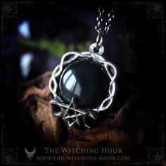 This pentagram pendant is adorned with a large natural rainbow obsidian. The pentagram symbolizes the union between the mind and the natural elements (water, air, earth and fire). - High quality pewter, 97% pure and hypoallergenic - Totally handmade - Natural rainbow obsidian - Sold without chain, choose your stainless steel chain of 46 cm / 17" or 60 cm / 24" (hypoallergenic) - Size of the pendant: 3,5 x 3,8 cm This pendant is an original creation of The Witching Hour It was designed and totall Mystical Black Necklace For Gift, Mystical Healing Necklace With Cabochon, Silver Obsidian Pendant Necklace, Spiritual Silver Obsidian Necklace, Black Gothic Necklaces For Larp, Handmade Black Necklace For Larp, Silver Obsidian Jewelry For Healing, Handmade Black Mystical Necklace, Spiritual Obsidian Pendant Jewelry