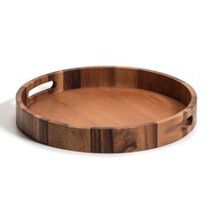 an oval wooden tray with handles