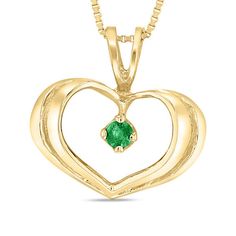 The May birthday girl will adore the keepsake significance attached to this delightful gemstone heart pendant. Crafted in warm 14K gold, this sweetheart style highlights a petite verdant-green emerald solitaire shimmering inside a sculpted ribbon heart. A textured stripe adds detail to the frame, while a dainty "V"-split bail completes the look. Simply charming with a brilliant buffed luster, this darling drop suspends along an 18.0-inch box chain that secures with a spring-ring clasp. Emerald Heart Charm Jewelry, Heart-shaped Emerald Jewelry With Birthstone, Green 14k Gold Heart Jewelry, Heart-shaped Emerald Jewelry For May Birthstone, Heart-shaped Emerald Birthstone Jewelry, Heart-shaped Green Emerald Necklace As Gift, Heart-shaped Green Emerald Necklace For Gift, Heart-shaped Emerald Jewelry For Valentine's Day, Green Heart-shaped 14k Gold Jewelry