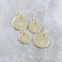 14k Gold Initial Charm Personalized Name Disc Solid Gold | Etsy Dainty Hand Stamped 14k Gold Charm Necklaces, 14k Gold Filled Gold Charms For Everyday, 14k Gold Filled Yellow Gold Charm Necklace For Anniversary, Minimalist Gold Charm Necklaces, Everyday 14k Gold Filled Gold Charms, Everyday 14k Gold-filled Gold Charms, 14k Gold Filled Pendant Charm As Gift, 14k Gold Filled Pendant Charm For Gift, Personalized Gold Charms For Everyday