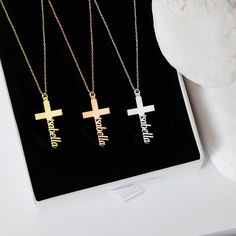 "Discover the elegance of our 14K Solid Gold Cross Necklace, thoughtfully designed to add a personalized touch. Through its unique craftsmanship, your precious name takes a graceful position at the cross's pinnacle. As a Tiny Cross Necklace, it emerges as a heartfelt gift, echoing sentiments of love, devotion, and individual essence. PRODUCT DETAILS * Material: 14K Solid Gold (real solid gold, no gold-filled or no gold plated material) * Choice of Gold Color: Yellow Gold, Rose Gold, White Gold * Closure: Spring ring * Chain style: Cable * Style: Minimalist Thinking of gifting? Elevate your order with our Christmas Gift Wrap option! 🎁 Buy from here! https://www.etsy.com/listing/1580219719/ M O R E F R O M U S Mionza Jewels' pieces are handcrafted by 30 years of experienced craftsmen and ma Affordable Personalized Cross Necklace Gift, Cross-shaped Name Jewelry For Anniversary, Name-engraved Cross Jewelry For Anniversary, Anniversary Jewelry With Name And Cross Shape, Minimalist Personalized Cross Necklace, Cross Pendant Jewelry With Name For Gift, Name-engraved Cross Pendant Jewelry Gift, Name Engraved Cross Pendant Jewelry Gift, Name Engraved Cross Pendant Jewelry For Gift