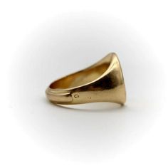 This is part of Chairish’s Fine Jewelry assortment.  This 18k gold signet ring is designed by French Art Deco artist and jewellery maker Jean Després.  At first glance, it is a classic signet ring engraved with simplistic geometric patterns. But with a closer look, the pattern represents water. Després simplified an image of ocean waves and the horizon—the Aquarius Zodiac sign— into these three varying lines. Though understated, the width and angles of the lines give surprising texture to the mi Art Deco Artists, Aquarius Zodiac Sign, Gold Jeans, Jewellery Maker, Zodiac Signs Aquarius, Gold Signet Ring, Aquarius Zodiac, French Art Deco, Jewelry Maker