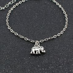 New Elephant Ankle Bracelet ~Choose from Stainless steel anklet chain or Silver plated anklet chain ~Anklet measures available in 9 inch, 10 inch, or 11 inch length plus has a 1 inch extender ~Elephant charm measures 1/2 inch wide ☆ Ships within 24 hours of purchase Monday-Saturday Adjustable Alloy Anklets For Gift, Adjustable Alloy Anklet As Gift, Summer Silver Alloy Bracelets, Silver Alloy Anklet As Gift, Adjustable Alloy Summer Anklets, Summer Adjustable Alloy Anklets, Adjustable Metal Anklets Nickel Free, Bohemian Silver Anklets As Gift, Bohemian Metal Anklets With Adjustable Chain