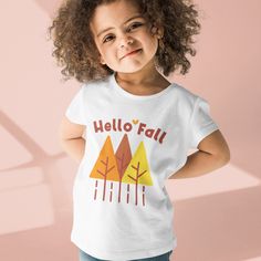 "Hello Autumn Organic cotton kids t-shirt clothing. Check out matching \"Hello Fall design adult t-shirt\": https://www.etsy.com/listing/1054384063/hello-fall-simple-autumn-tree-design?ref=shop_home_active_2&pro=1&frs=1 Put your kids in a t-shirt that's cute, super comfortable, and made of natural fabrics! This 100% organic cotton tee is sure to become their favorite! * 100% organic ring-spun combed cotton * Fabric weight: 4.57 oz/yd² (155 g/m²) * Single jersey * Medium fit * Set-in sleeves * 1× Playful Pre-shrunk T-shirt For Fall, Playful Crew Neck T-shirt For Fall, Fun White T-shirt For Fall, Playful Short Sleeve T-shirt For Fall, Playful Short Sleeve Fall T-shirt, White T-shirt For Fall Family Matching, Fall Cotton T-shirt With Custom Print, Custom Print Cotton T-shirt For Fall, Fall Graphic Tee