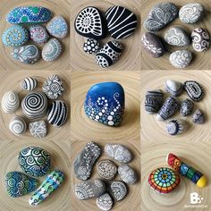 several different types of painted rocks sitting on top of a wooden table next to each other