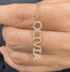 "This 14k personalized diamond name necklace is the perfect gift for the bridal party, someone special, or yourself. * All letters are capital. M A T E R I A L & L E N G T H Available in 14k Yellow Gold, 14k Rose Gold, 14k White Gold, Sterling Silver Thickness: 1.2mm / 0.05\" Initials Lowercase: 4 mm Capital: 8 mm Diamond: 0.10 ct. - 0.30 ct. depending on the name Color: G Quality: SI-VS Additional Notes: * Non-Conflict Diamonds * Made in the USA C U R R E N T ∙ T U R N A R O U N D Processin Yellow Gold Necklaces With Names For Anniversary, Anniversary Yellow Gold Name Necklace, 14k Gold Initials Name Necklace For Anniversary, Custom Name Necklace In Yellow Gold For Anniversary, Custom Yellow Gold Name Necklace For Anniversary, 14k Gold Diamond Initials Necklace For Anniversary, 14k Gold Diamond Necklace With Initials For Anniversary, 14k Gold Diamond Necklace For Anniversary With Initials, Yellow Gold Diamond Necklace With Initials For Anniversary