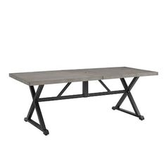 the table is made out of concrete and has black metal legs, with a wooden top