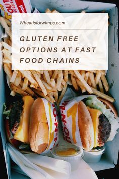 two cheeseburgers and french fries in a box with the words gluten free options at fast food chains