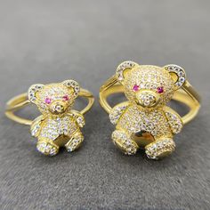 10k Solid Gold Teddy Bear Colorful CZ Ring * Metal : Real 10K Yellow Gold * Condition : Brand New * Finish : Polished * Size : 5 ~ 12 * Weight : 3.3 ~ 6.3 gram This is an approximate size & weight. Please expect up to ±10% difference. * Processing time : 1~3 business days * Ships from California This is 100% Authentic 10k Gold. Not plated or filled. All of our items are brand new and are shipped with a gift box. Teddy Bear Ring, Gold Teddy Bear, Bear Ring, Teddy Bear Design, Whimsical Jewelry, Cute Teddy Bears, Gift Cute, Ring Metal, Cz Ring