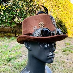 Adjustable High Crown Top Hat For Carnival, Carnival Adjustable Top Hat With High Crown, Novelty Costume Hat With Adjustable High Crown, Novelty Adjustable High Crown Costume Hat, Novelty Adjustable Top Hat For Festivals, Adjustable Novelty Mini Hat For Cosplay, Steampunk Brown Hat For Halloween, Steampunk Adjustable Costume Hats And Headpieces, Steampunk Brimmed Mini Hats For Cosplay