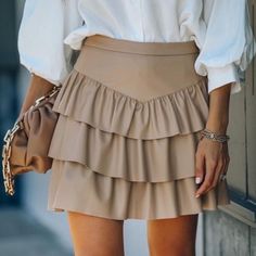 Brand New Beige Ruffle Skirt For Fall, Fall Ruffled Beige Skirt, Chic Tiered Mini Skirt, Elegant Beige Tiered Mini Skirt, Chic Beige Ruffled Skirt, Chic Cream Tiered Mini Skirt, Trendy Beige Mini Skirt For Fall, Casual Brown Skirt For Party, Trendy Brown Skirt For Spring