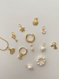 Build your own earrings with these dainty charms！It's removable and interchangeable with any of the earrings/necklaces. * The price is for ONE piece charm.  Discover our Build Your Own Jewelry Collection⇩ https://vannipearl.etsy.com [DETAILS] 14k Gold Plated over Brass Freshwater Pearl 5mm Charm Jump Ring  [Charm Size] Baroque Pearl: 8mm Double Pearl: 6mm Single Pearl: 6.8-7.5mm Pearl Loop: 1.6mm (diameter) Sun: 10.5mmx12mm Star: 12mmx10mm CZ Stone: 4mm Butterfly: 8mm Cloud: 10mmx11.5mm Rainbow: Luxury Pearl Charm Earrings, Single Pearl, Necklace Charms, Gold Charms, Purple Pearl, Pearl Charms, Cross Charms, Star Earrings, Gold Charm