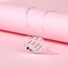 A piece that's absolutely exquisite from every angle, this necklace offers an irresistible combination of beauty and versatility. A birthstone for each child is a special way to honor your family. Engrave up to four names accompanied by their coordinating birthstones on our Heart Shaped Birthstone Necklace. Each child will feel loved and remembered while close to Mom's heart. Chain Type: Material: Plating Color: Silver Mother's Day Birthstone Necklace With Name On Round Pendant, Mother's Day Name Birthstone Necklace With Round Pendant, Mother's Day Round Pendant Birthstone Necklace With Name, Personalized Necklaces For Mom's May Birthstone, Sterling Silver Heart Birthstone Necklace For Birthday, Mother's Day Heart Necklace With Birthstone For Birthday, Customizable Heart Pendant Jewelry For Mother's Day, Mother's Day Birthstone Heart Necklace For Birthday, Sterling Silver Birthstone Necklace With Custom Name For Mom