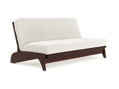 a white couch sitting on top of a wooden frame