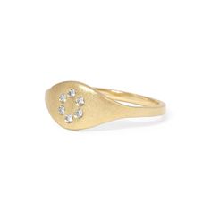 The true beauty of this ring lies in its discreet yet elegant circle of diamonds. Subtly nestled within the design, these diamonds add a touch of understated glamour, elevating your look without overwhelming it. Details: White diamonds .09tcw 14k gold Ready to ship - size 7 All other sizes are made-to-order and can take up to three weeks to ship Minimalist Diamond Stackable Rings With Accents, Minimalist Stackable Diamond Rings With Accents, Single Diamond Ring Jewelry, Diamond Stackable Rings With Pave Setting, Elegant Oval Stackable Rings With Diamond Accents, 14k Gold Diamond Ring With Single Diamond, Diamond White Open Ring With Single Diamond, Minimalist Diamond Ring With Round Cut Accents, Minimalist Diamond Ring With Diamond Accents