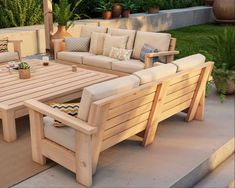 a wooden table sitting on top of a patio