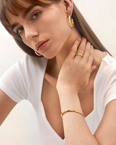 Select this eroded bangle bracelet for an effortless yet contemporary style, ideal for those who love a two-toned pattern fashioned into a subversive-basic design. Elevate your look with a casual and cool piece, perfect for any occasion.
Band Width: 5.5mm
Band Thickness: 3mm
Material: 18k Gold & Rhodium Plated Everyday Tarnish Resistant Cuff Bangle, Minimalist Tarnish Resistant Cuff Bracelet, Modern Hoop Bangle For Everyday Wear, Modern Hoop Bangle For Everyday, Fine Jewelry Everyday Bangle Bracelet, Elegant Hoop Cuff Bracelet For Everyday, Gold Plated Bangle Cuff Bracelet, Gold Plated Bangle Cuff Bracelet For Everyday, Minimalist Everyday Gold Plated Cuff Bracelet