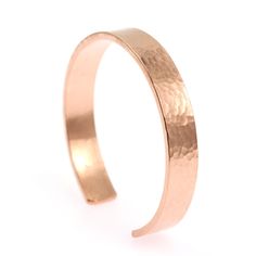 PRICES MAY VARY. 8 Inches in Circumference (length around wrist) – 6 ¾ inches of copper with 1 1/4 inch opening. Cuff adjusts to fit your wrist. Copper Thickness: 1.5mm, Width: 10mm or ½ inch. 100% UNCOATED SOLID COPPER - Allow to Patina for an Organic Antiqued Look. To restore shine, clean with ketchup. Apply with a soft toothbrush or cloth, gently scrub, then rinse thoroughly with warm water, and dry/buff with a soft cloth. A mild Copper or Brass cleaner can also be used (test first). Care Car Hammered Bracelet, Copper Jewelry Handmade, Bracelets Bangle, Copper Cuff Bracelet, Copper Cuff, Copper Rings, Copper Necklace, Hammered Copper, Copper Bracelet