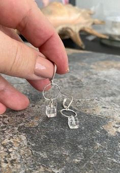 "Small clear crystal quartz drop dangle hoop earrings available in vermeil gold or sterling silver.  They'll quickly become your everyday pair.  They go with everything!  The earrings measure approx 1.5\" from end to end and the clear quartz cubes are approx 8mm. You may also like to view more of my quartz jewelry here: https://etsy.me/3KDnbuw You may also like view more of my earrings here: http://etsy.me/2e2BGZl" Everyday Sterling Silver Clear Earrings, Everyday Clear Sterling Silver Earrings, Modern Dangle Crystal Earrings With Ear Wire, Clear Small Hoop Earrings As Gift, Nickel Free Sterling Silver Clear Crystal Earrings, Hypoallergenic Sterling Silver Crystal Earrings For Everyday, Nickel-free Sterling Silver Clear Crystal Earrings, Modern Sterling Silver Dangle Crystal Earrings, Everyday Hypoallergenic Sterling Silver Crystal Earrings