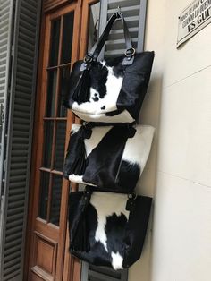 Cowhide Travel Bag ABSOLUTELY UNIQUE You will receive the exact same bag pictured Wonderful 100% Natural Cowhide Rug Brand New. Never Used 1st quality of Argentinian Hair on Leather. Completely Hand Made Ask other colours SIZES LOOK PICTURES Super soft / Pleasant leather smell. Ship Worldwide Online Inventory https://picasaweb.google.com/mission.cueros/CuerosPremium Cow Print Bucket Bag, Luxury Calf Hair Bags For Shopping, Luxury Textured Calf Leather Bags, Costume Cowhide Bags, Luxury Chic Calf Hair Bags, Handmade Purses And Handbags Rockcow Leather Studio, Luxury Calf Leather Bags With Gunmetal Hardware, Cowhide Clutch, Handmade Leather Purse