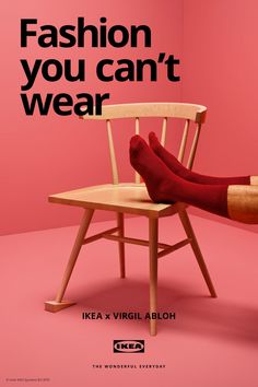 a person sitting in a chair with their feet up on the back of a chair that says, fashion you can't wear