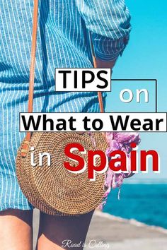 a woman walking on the beach with her hand in her pocket and text that reads tips on what to wear in spain