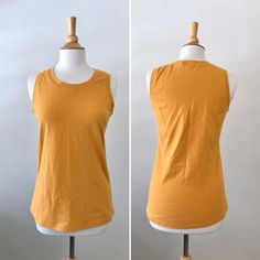 Basic cotton knit tank top.  This is a nice basic tank top that can be worn alone or layered. Length from shoulder to hem is about 25”  *Length can be adjusted for you as neededColor shown is Mustard Garments are Made To Order Please allow 7-10 days for your item to be sewnBelow are my standard size measurements, which are simply a guideline, if you would like to include your personal measurements in the notes to seller box during checkout, I will be sure to make you the best fit ~ if you have a Fitted Sleeveless Cotton T-shirt, Cotton Muscle Tee For Summer, Basic Cotton Crew Neck Tank Top, Casual Cotton Stretch Muscle Tee, Basic Crew Neck Tank Top, Basic Fitted Everyday Tank Top, Basic Fitted Tank Top For Everyday, Basic Everyday Fitted Tank Top, Casual Sleeveless T-shirt For Layering