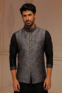 Grey sleeveless bundi in pashmina blend silk base with all over floral embroidery. Paired with long puffed sleeves kurta and a trouser.
Components: 3
Pattern: Floral
Neckline: Band Collar
Sleeve Type: Bundi: Sleeveless, Kurta: Long
Fabric: Silk
Color: Grey
Occasion: Sangeet, Wedding - Aza Fashions Kurta Set Men, Sleeveless Kurta, Nehru Jacket, Nehru Jackets, Gray Silk, Band Collar, Fabric Silk, Long Puff Sleeves, Kurta Set