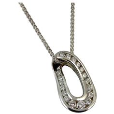 Modern Diamond Multi-Stone Pendant, White Gold, Spiga Link Chain | From a unique collection of vintage Pendant Necklaces at https://www.1stdibs.com/jewelry/necklaces/pendant-necklaces/. Exquisite Oval Necklace With Single Cut Diamonds, Formal Oval Pendant Diamond Necklace With Single Cut Diamonds, Formal Diamond Necklace With Oval Pendant, Exquisite Oval Diamond Necklaces, Exquisite Oval Pendant Necklace With Brilliant Cut, Luxury Oval Platinum Necklaces, Luxury Oval Platinum Necklace, Luxury Platinum Oval Necklace, Luxury Oval Link Diamond Necklace For Formal Occasions