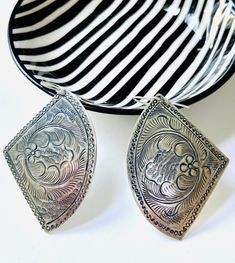 "Unique quarter-circle lightweight pendants are hand-etched vintage brass from the 80s finished in silver.  These are great everyday earrings and part of a whole collection of Mexican style stamped pendant. You'll get one and want them all. * Each pendant is approximately 1 1/2\" long x 1 1/2\" wide at the widest point.  * Earring backs are high quality sterling silver (.925) French loop or lever back ear wire. Clip on earrings for non-pierced ears available. Choose your preference from the drop Silver Engraved Brass Earrings, Engraved Silver Brass Earrings, Antique Silver Engraved Earrings For Gift, Antique Silver Engraved Earrings Gift, Traditional Silver Etched Earrings, Traditional Etched Silver Earrings, Vintage Silver Medallion Earrings, Bohemian Stamped Earrings, Vintage Etched Earrings