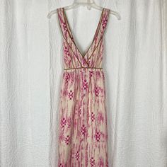 Loft Women’s 100% Silk Ikat Print Maxi Dress Sz 4 Nwt Gorgeous Champagne & Fuchsia With Golden Bronze Hemline Cross Cross Back Straps Deep V-Neck Fully Lined Elastic At Back Side Zipper New With Tags Chest 16” Waist 21” Length 56.5” Excellent Condition! Silk Ikat, Ikat Print, Loft Dresses, Printed Maxi, Printed Maxi Dress, Deep V Neck, Side Zipper, Champagne, Loft