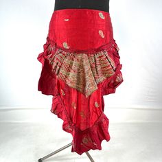 Luna Steampunk Over Skirt, Bustle skirt, tribal mini skirt, fashioned from vintage silk brocade.  This tail skirt is a great addition to all sorts of outfits.  Easily add an extra, colourful layer over leggings, tights, skirts or shorts. Wear at the back or side. The skirt is adjustable in fitting. It has 2 silk ties which are attached to two strong brass hoops for added style and functionality. Strong stitching, pleating and layers of ruched fabric on the tail makes this an eternally stunning p Red Mini Skirt For Cosplay, Bohemian Skirt For Cosplay, Red Mini Skirt For Alternative Fashion, Stretch Mini Skirt For Alternative Fashion, Red Fitted Mini Skirt For Alternative Fashion, Punk Style Fitted Asymmetrical Skirt, Red Punk Style Skirt For Party, Red Punk Skirt For Parties, Belly Dance Tiered Skirt For Festivals