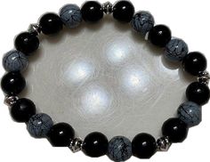 Casual Black Stretch Bracelet With Gemstone Beads, Black Beaded Bracelets With Polished Beads, Cheap Blue Bracelets With Black Beads, Casual Black Beaded Bracelets With Round Beads, Silver Beaded Bracelets With Black Round Beads, Black Stretch Bracelet With Gemstone Beads, Black Polished Beads Bracelet, Spiritual Black Bracelets With Silver Beads, Casual Silver Stretch Bracelet With Black Beads