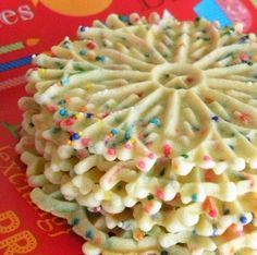 a close up of a cake with sprinkles on it