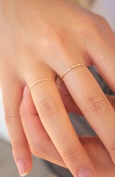 Intricate texturing brings sophisticated charm to a minimalist 14-karat gold ring with stackable versatility. 14k gold Made in the USA 14k White Gold Open Band Midi Rings, Simple Hammered 14k Gold Rings, Minimalist Hammered 14k Gold Stackable Rings, Delicate Stackable 14k Rose Gold Rings, 14k Gold Hammered Stackable Promise Rings, Dainty Hammered Yellow Gold Rings, Minimalist Hammered Yellow Gold Rings, Minimalist Hammered Stackable Rings In Recycled Gold, Elegant Hammered Midi Rings For Wedding