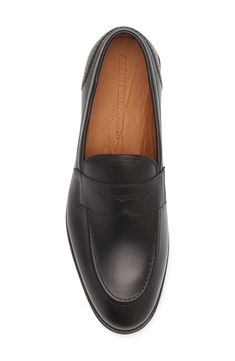 A streamlined silhouette and almond toe bring timeless sophistication to a leather loafer grounded by a cushioned footbed. Leather upper, lining and sole Made in the USA Classic Calf Leather Slip-ons For Office, Classic Calf Leather Almond Toe Slip-ons, Formal Calf Leather Slip-ons With Leather Footbed, Classic Calf Leather Slip-ons With Round Toe, Classic Calf Leather Slip-ons For Formal Wear, Classic Business Slip-ons With Plain Toe, Classic Slip-ons With Leather Footbed For Business Casual, Classic Slip-on Dress Shoes With Almond Toe, Semi-formal Loafers With Removable Insole