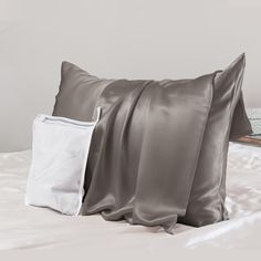 PRICES MAY VARY. Silk 【GOOD HOUSEKEEPING BEDDING AWARDS 2023-BEST VALUE 100% SILK PILLOWCASE】Rated smooth by sleep testers; Perfect moisture-wicking scores; Good assortment of sizes and configurations 【OEKO-TEX STANDARD 100 CERTIFIED】Promeed 23 Momme silk pillowcase is made with highest quality Organic Grade 6A+ Mulberry Silk, which is super soft, cooling, and non-absorbent making it ultra breathable, preventing breakouts and reducing sleep wrinkles. Our organic silk pillowcase contains powerful Fun Pillow Cases, Grey Pillow Cases, Silk Pillow Case, Silk Pillowcase Hair, Silk Pillow Cover, Silk Bedding, Satin Pillowcase, Acne Free, Gray Silk