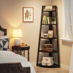 a book shelf in the corner of a bedroom