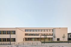 an empty courtyard in front of a building