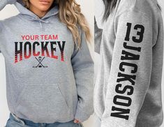 two women wearing hockey hoodies and sweatshirts with the words your team, hockey on them