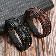 Material: Leather Modern Brown Leather Wristband, Leather Wristband For Everyday Use, Brown Leather Bracelet Fashion Accessory, Black Leather Casual Wristband, Casual Black Leather Wristband, Modern Brown Leather Bracelet With Wrist Strap, Black Bracelet For Everyday Use, Black Bracelets With Strap For Everyday Use, Modern Braided Leather Bracelets With Black Band