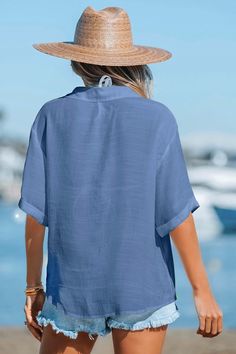 Complete your beach look with our Button Front Collared V-Neck Cover-Up Top. The button front and collared V-neck add a touch of classic charm, making it the perfect cover-up for a day by the water. Product code: CAA07A3B003UU Features:  Woven  V-neckline with collar Short sleeves Front buttons Loose fit Wash Method: Regular Wash Material: 65%RAYON,35%POLYESTER. V-neck Beach Top With Button Closure, Summer Vacation Tops In Solid Color, Solid Color Summer Tops For Vacation, Solid Color Tops For Summer Vacation, Vacation Tops With Buttons And Camp Collar, Casual V-neck Blouse For Beach Season, Beachy V-neck Top For Day Out, Collared Beach Top With Button Closure, Short Sleeve Solid Color Beach Tops