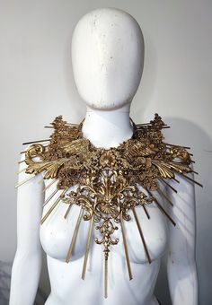 golden zip tie bib necklace decorated with baroque moldings and angels This piece is ready to ship Very lightweight and comfortable to wear Gold Baroque Necklace For Parties, Gold Bib Necklace, Gold Body Jewelry, Gold Body Jewellery, Jewelry Big, Contemporary Necklace, Tie Necklace, Gold Bodies, Fantasy Dress