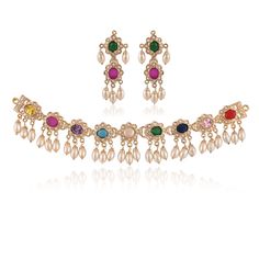 Gold Plated Multicolor Choker Set, Sabyasachi Jewelry Set, Indian Pearl Necklace, Jadau Kundan Choker, Pakistani Jewelry This is a Beautiful Jadau Necklace Set in Gold Plating with Pearl highlights. It's Gorgeous Set to Compliment your latest Indian Attire. The biggest boon of these sets is the Multicolor that makes them ideal for people who prefer stylish designs. Products from this collection will add an undeniable amount of charm to your entire outfit and enhance your complete look. *PRODUCT Elegant Multicolor Jewelry For Puja, Multicolor Temple Necklace With Tilla For Navratri, Multicolor Tilla Temple Necklace For Navratri, Temple Jewelry Necklaces For Eid Puja, Temple Jewelry Necklaces For Puja And Eid, Multicolor Ceremonial Jewelry For Navratri, Elegant Multicolor Temple Necklace For Diwali, Multicolor Necklaces For Puja, Multicolor Kundan Temple Necklace For Ceremonial Occasions