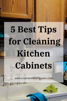 a kitchen sink with the words 5 best tips for cleaning kitchen cabinets on top of it